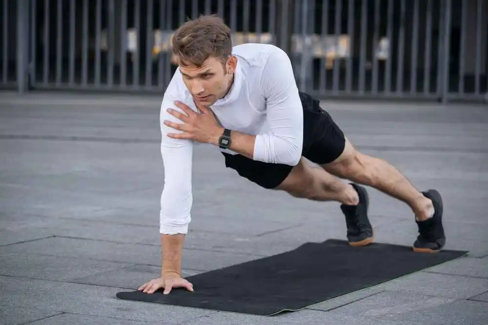 Plank with Shoulder Tap